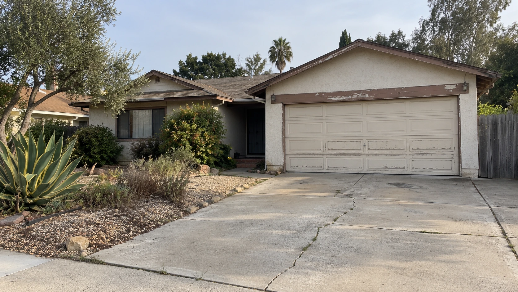 As-is fixer-upper house exterior in San Diego